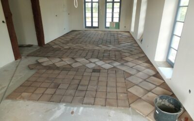 Baustellenbild: Verlegung von Terracotta Fliesen